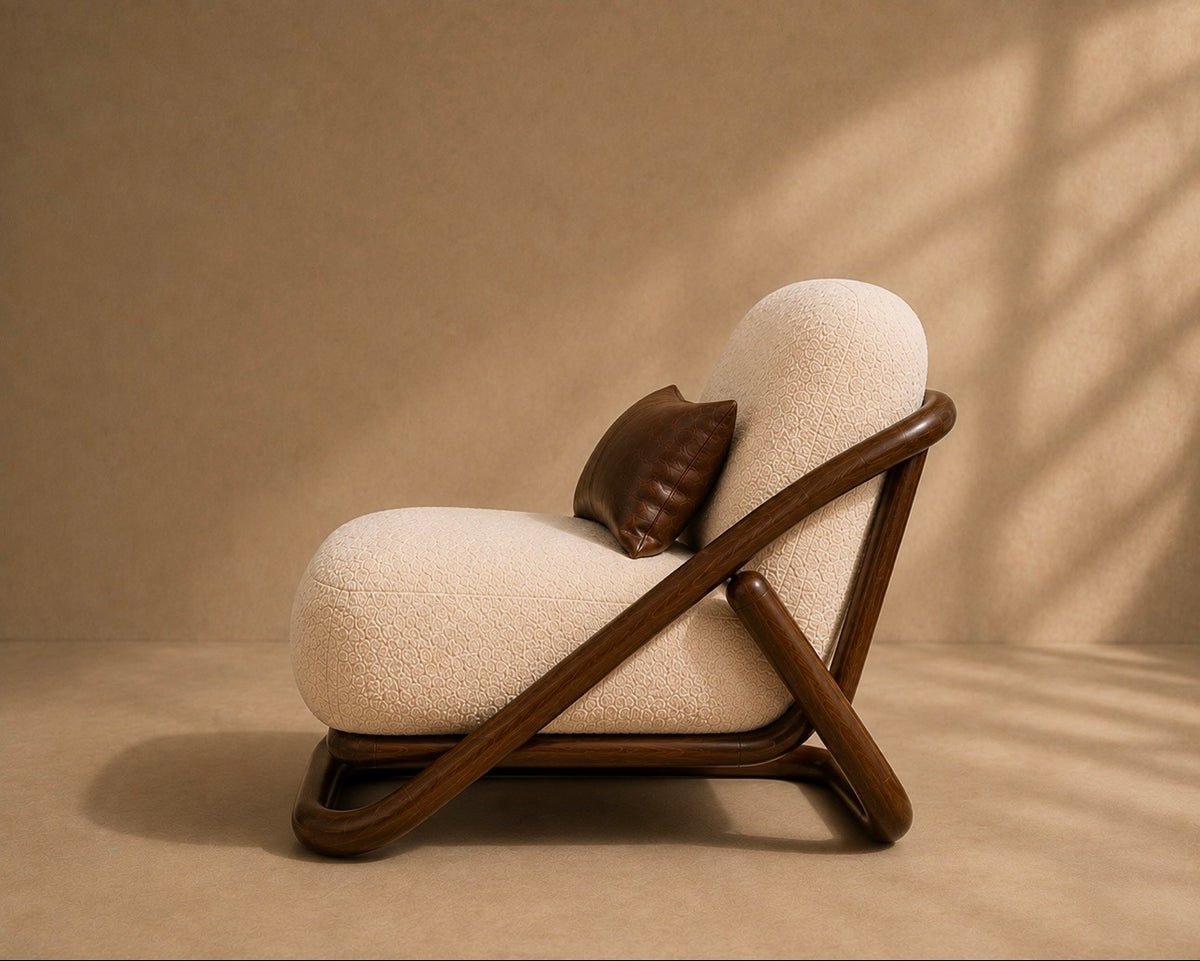 Montu lounge chair in side profile, showing the low recline and the looped floor rail
